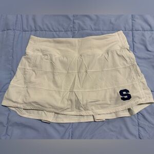 Gently used, Lululemon Pace Rival Mid-Rise White Skirt with iron on “S”